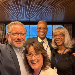 Mike Fabarez taking a selfie with three smiling people